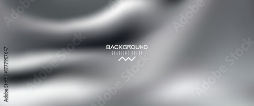 Liquid metal surface with elegant waves and silky reflections. Dynamic black and white pattern resembling