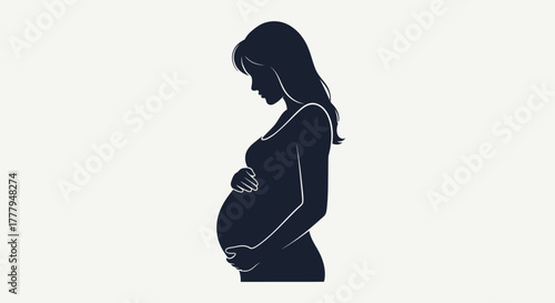 Silhouette of a pregnant woman in profile, cradling her belly with both hands.