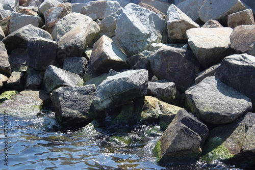 Fototapeta Naklejka Na Ścianę i Meble -  Coastal rocks and stones by the sea