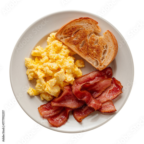 Breakfast Plate With Scrambled Eggs, Bacon, and Toast Served on a White Dish