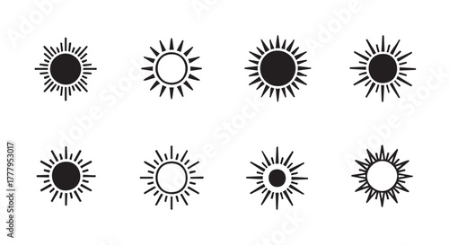 Four sun icons in black and white vector illustration design