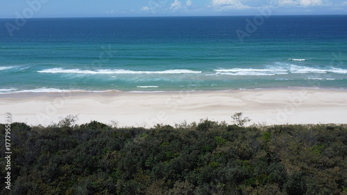 Aerial view of pristine turquoise beach