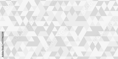 White triangular mosaic backdrop. Polygonal mosaic abstract banner background. Seamless modern pattern. 