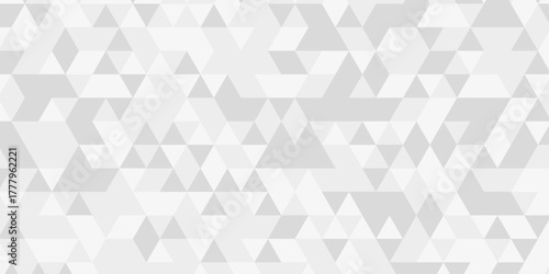 White triangular mosaic backdrop. Polygonal mosaic abstract banner background. Seamless modern pattern. 