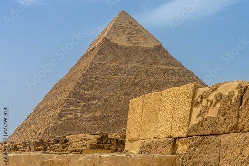 Ancient Pyramid of Khafre with stone ruins in the foreground, Giza, Egypt