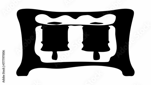 Two bells displayed on a stand with a decorative top in a black and white silhouette style image