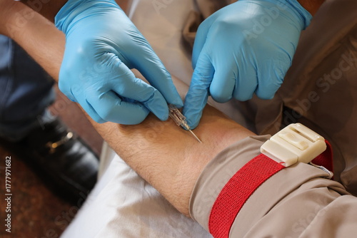Medical Professional Performing Venipuncture for Blood Test