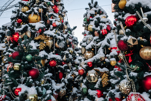 Christmas tree and New Year decorations on the town square on a frosty winter day.