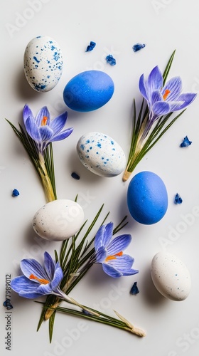 Colorful Spring Crocuses With Decorative Eggs on a Light Surface Showcasing S...