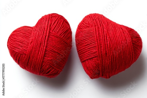 Red Heart-Shaped Yarn Balls for Crafting Projects on a White Background