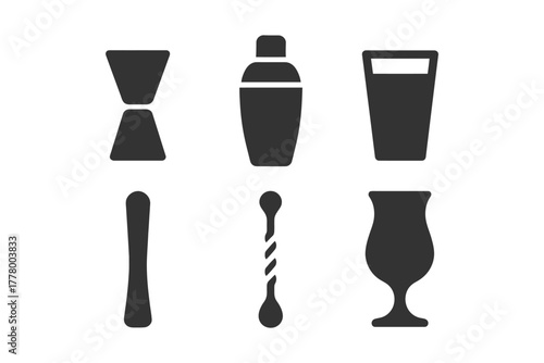 Set of black bartender tools and glasses silhouettes on white background.