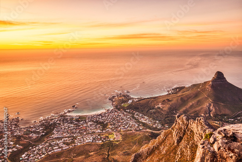 Cape Town Sunset Aerial View from Table Mountain over Camps Bay, Lion's Head and Twelve Apostles in the Background