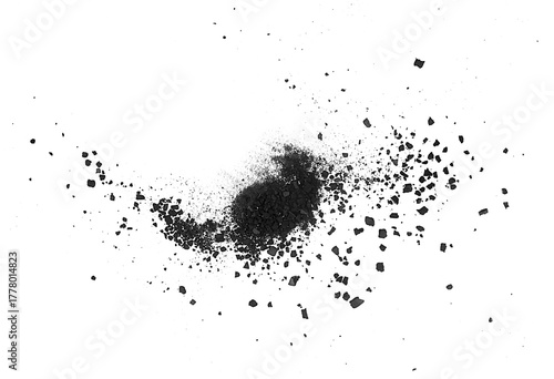 Wood carbon particles isolated on a white background, view from above. Scattered coal pieces.