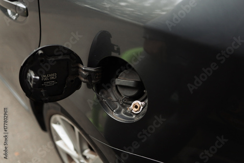 Fuel tank, fuel tank cap, filling the car with gas. Car open refill gas tank to refuel in gas station