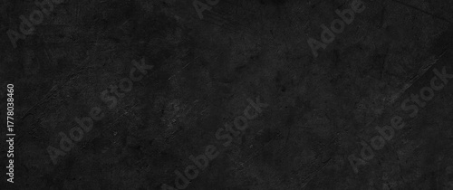 Dark grey textured concrete black wall background