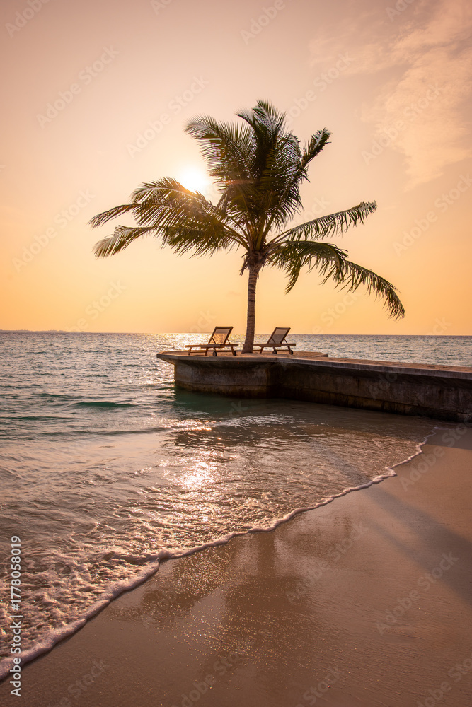 Fototapeta premium Tranquil closeup calm sea water waves with palm trees. Beautiful sunset panorama. Tropical island beach landscape exotic shore coast. Summer vacation, holiday amazing nature. Relax paradise, Maldives.