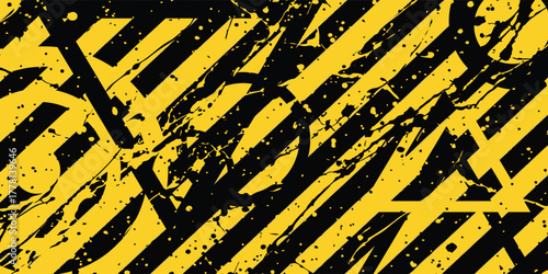 Abstract grunge background with yellow and black diagonal hazard stripes and paint splatters.
