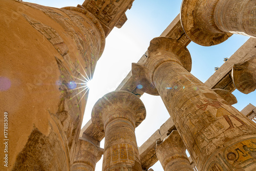 Low angle view of massive columns in the Great Hypostyle Hall at Karnak Temple