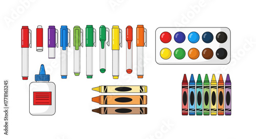 Art supplies layout markers crayons glue and a watercolor palette neatly arranged