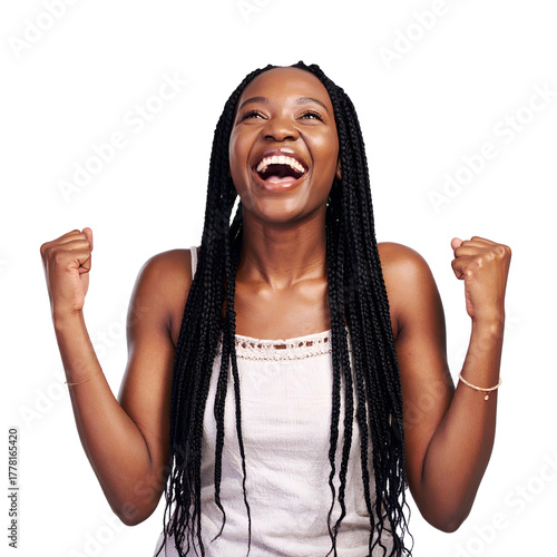 Excited young woman cheering with fists raised, joyful