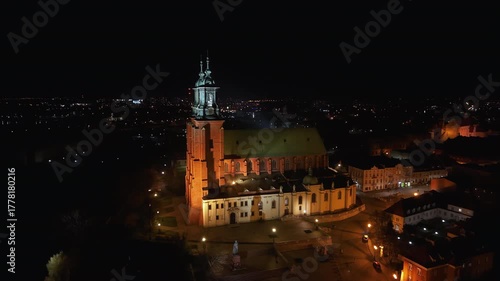 Aerial Gniezno Poland Archcathedral cityscape night 2. Since 1000 AD, main church of the Gniezno. Basilica of the Assumption of the Blessed Virgin Mary or the Sanctuary of St. Adalbert. 