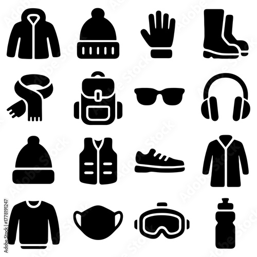Winter Essentials: A collection of essential winter wear and accessories. From warm coats to cozy gloves, the scene represents the essential items for cold weather. 