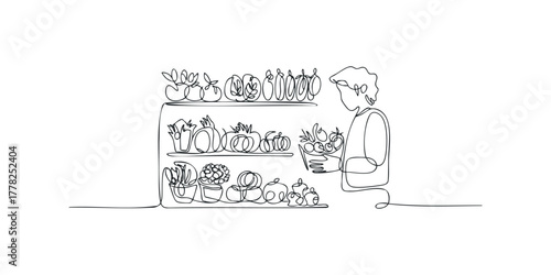 Person selecting fresh produce from market stall
