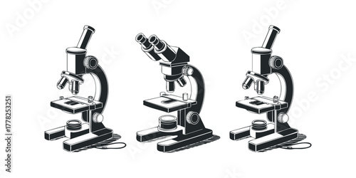 Three vintage microscopes displayed in monochrome