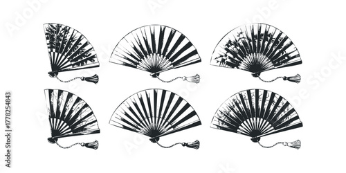 Collection of six black and white oriental fans with tassels