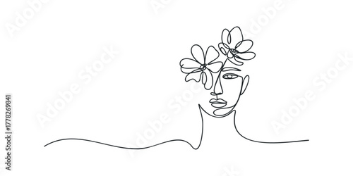Abstract line drawing of a female face with flowers