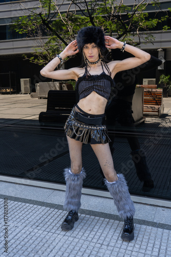 Goth fashion model posing in urban street style