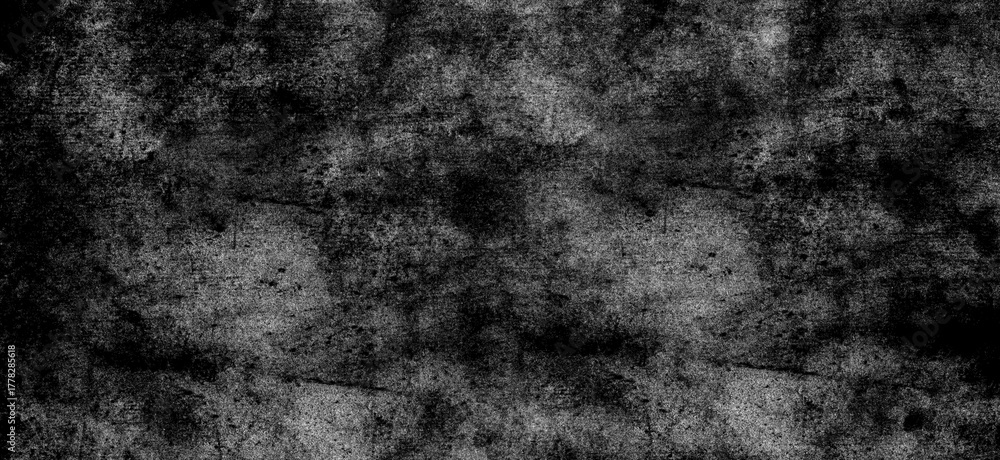 Fototapeta premium Dark monochrome abstract texture with dense brush strokes and splatters, ideal for creating a gritty and atmospheric background or overlay effect