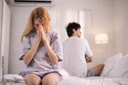 Couples who are angry at each other, fighting in bed, feeling frustrated, sad, divorce or relationship problems, marital stress, quarrels and arguments, unhappy spouses, and sexual dysfunction.