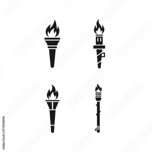 Collection of four different torch icons representing fire and illumination, ideal for graphic design and symbol creation