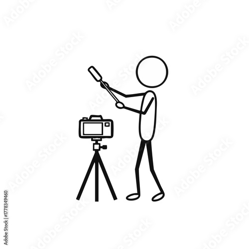 A stick figure uses a selfie stick and a camera on a tripod to take a picture, capturing a moment of self-expression.