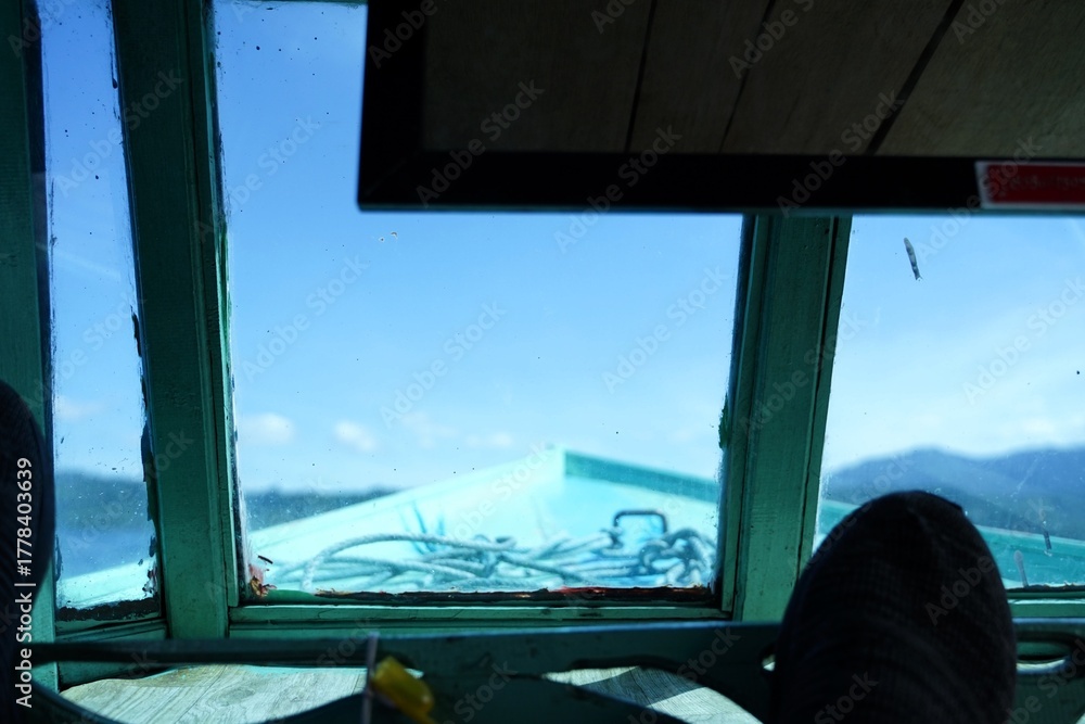 Fototapeta premium View inside the cabin of a wooden ship under sailing