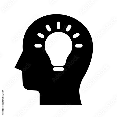Glyph Icon of human head silhouette with light bulb representing idea and inspiration