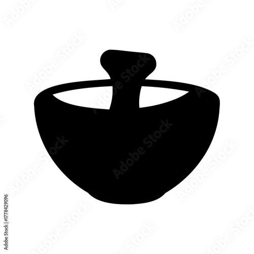 Monochrome silhouette of a traditional Hanukkah dreidel or spinning top toy