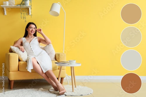 Young woman sitting in armc...