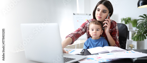 Young mother with her son w...