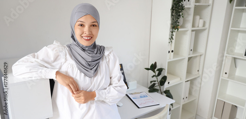 Portrait of young Muslim bu...