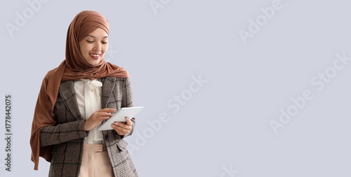 Young Muslim businesswoman ...