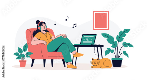 Relaxed woman enjoys music with headphones in a cozy living room setting with a laptop, plants, and a sleeping cat.
