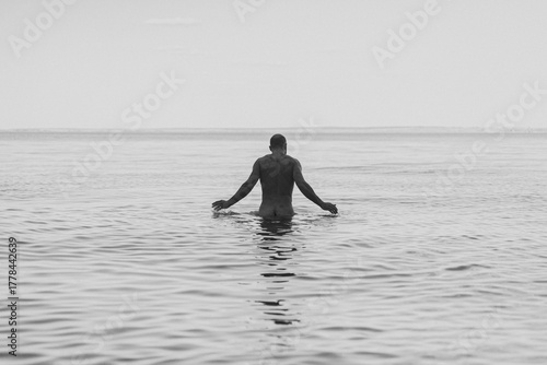 Wallpaper Mural A Man Swims Alone Torontodigital.ca