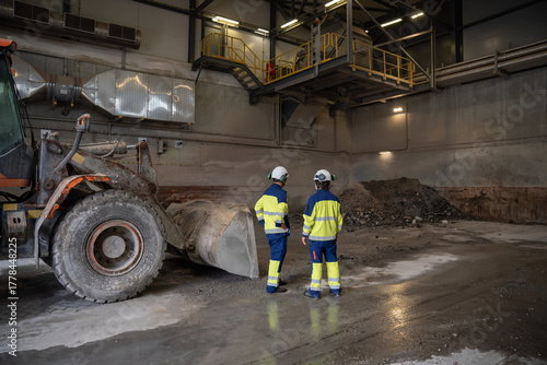 Workers at waste incineration site