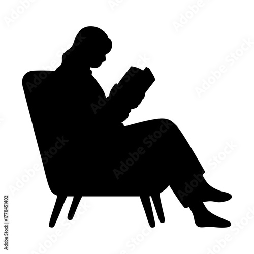 silhouette of a person reading a book