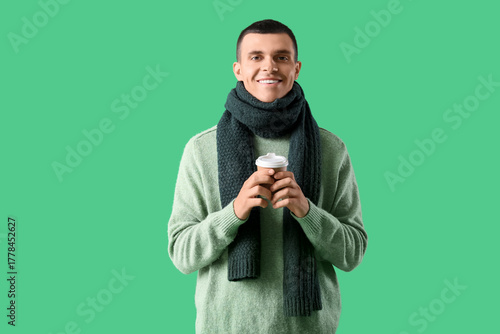Young man in winter clothes...