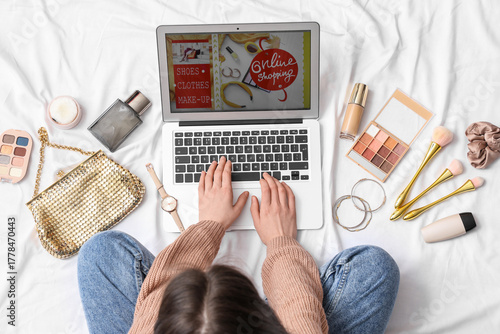Young woman with laptop, ma...