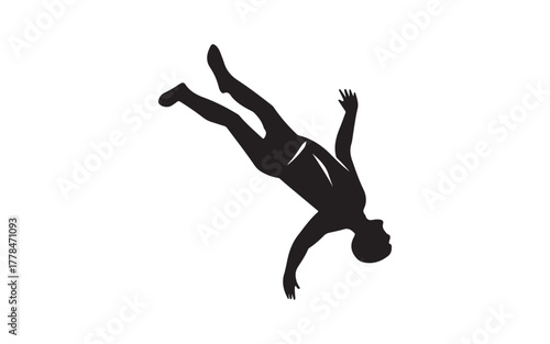 silhouette of a young man parachute jumping
