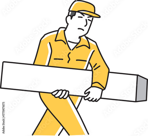 長細い箱を運ぶ男性作業員